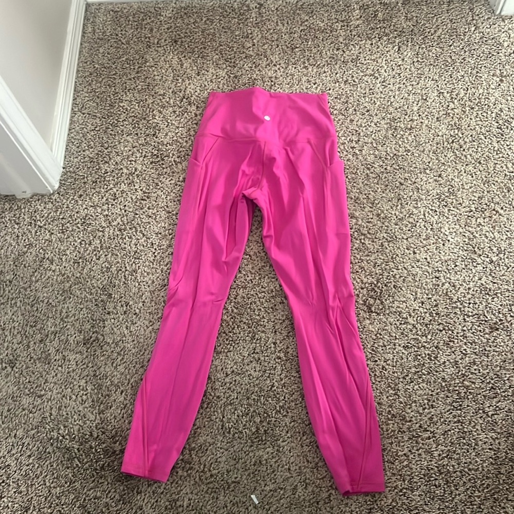 Lululemon size 6 neon pink leggings